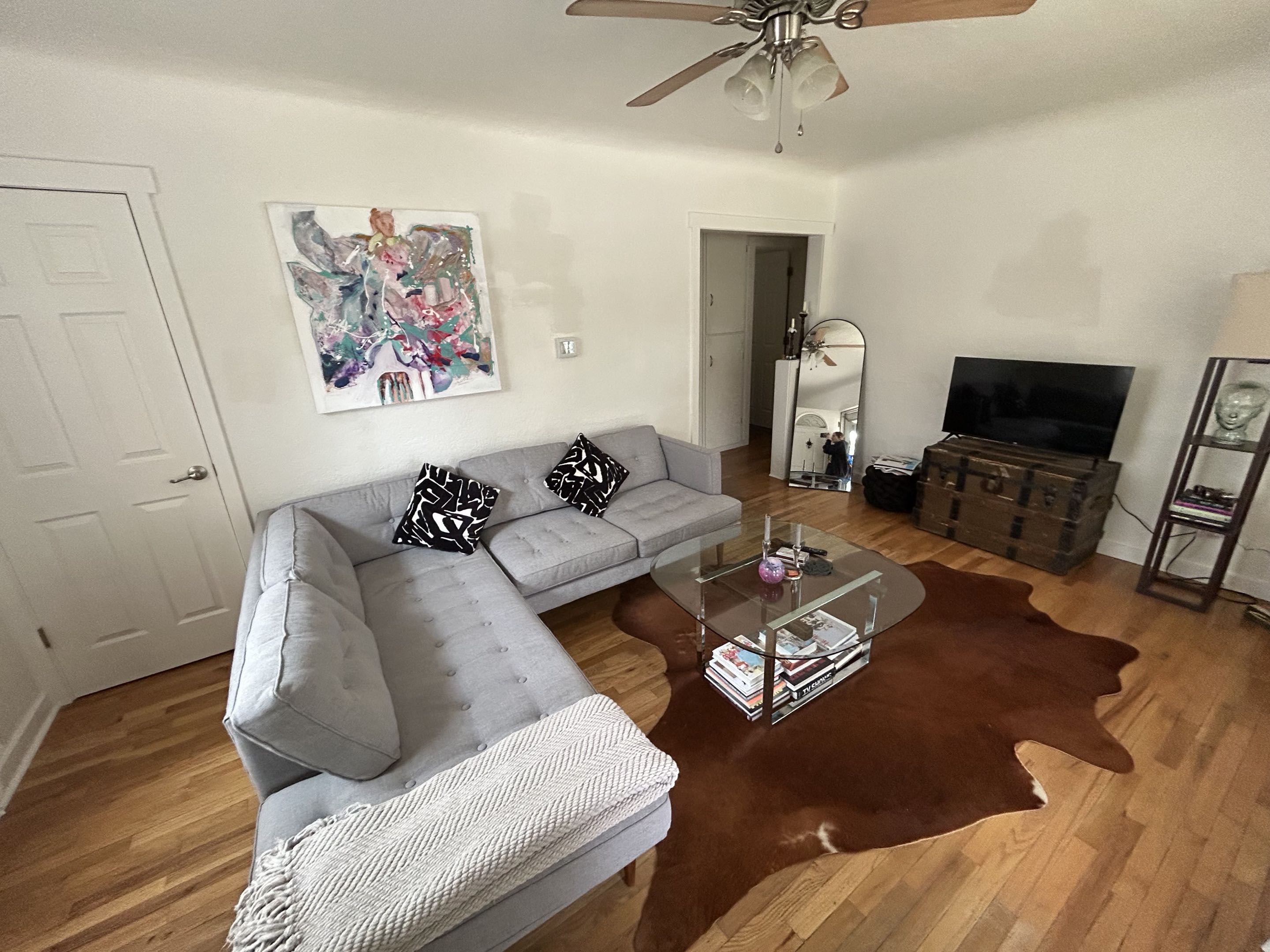 Tidy, spotless living room with sectional sofa